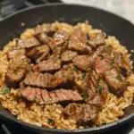 Honey Garlic Butter Steak and Rice in Skillet