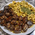 Tender Steak Bites with Pesto Alfredo Tortellini Sauce